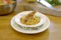 Discover the origins of prawn risotto 